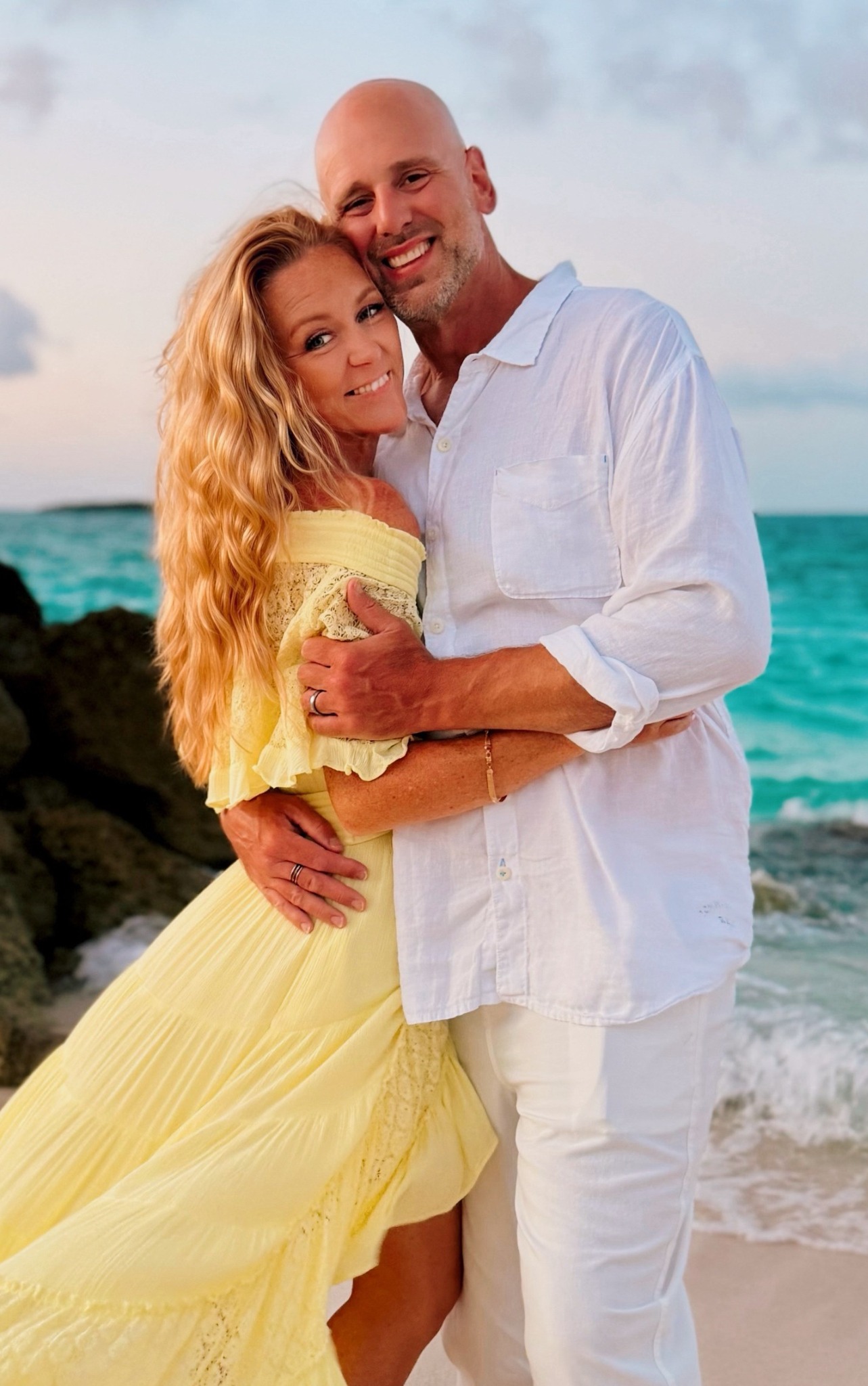 Matt and Kara Davenport together by the ocean